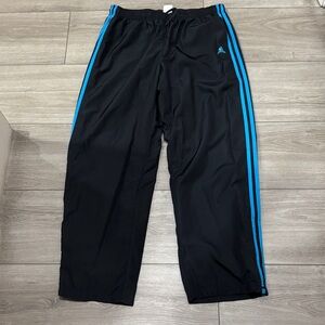 Adidas Black Pants with Vibrant Blue Accents